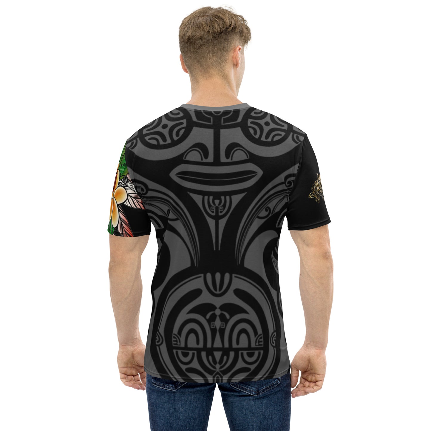 Tagaloa Tattoo tee features a Pacific tattoo design in the background, with a tiki motif that seems to be looking at the woman's profile on the front